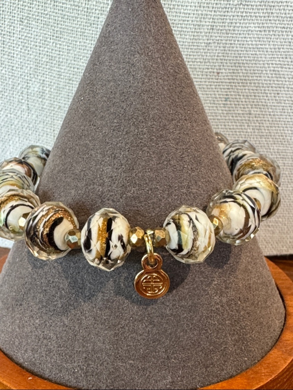 BuDhaGirl  Gold and Cream Beaded Bracelet with Charm